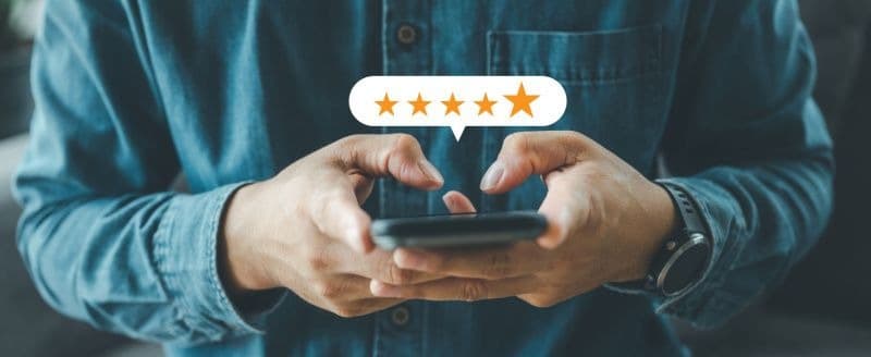 Five star review on a phone