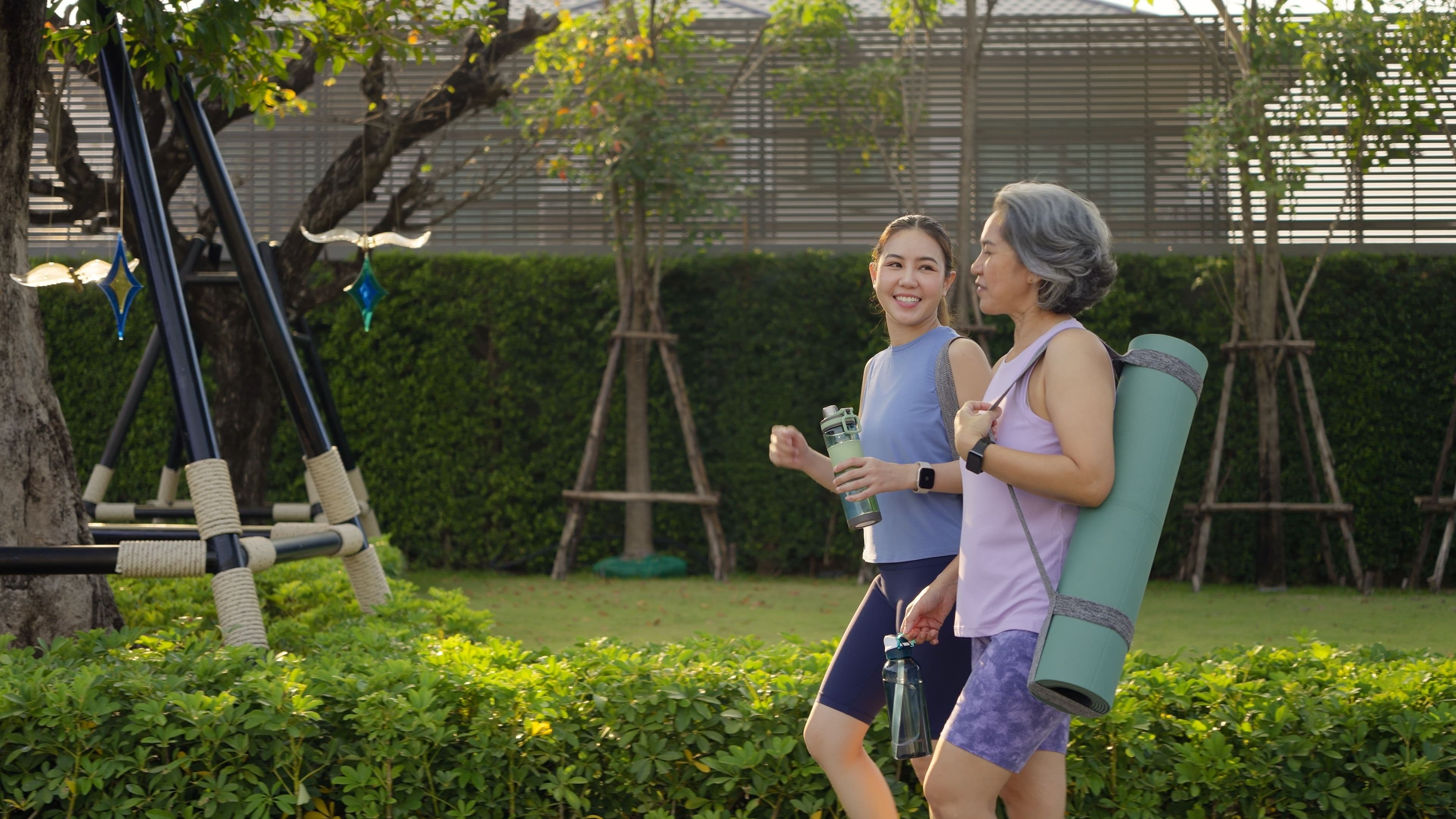 Women walking outdoors during a wellness session